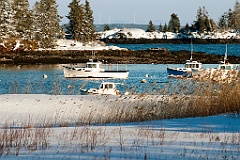 Fishing Boats in Snow Covered Owls Head Harbor in Maine